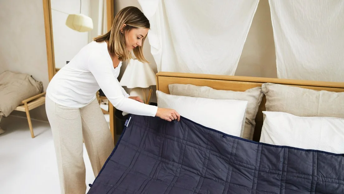 A RESET member making a bed