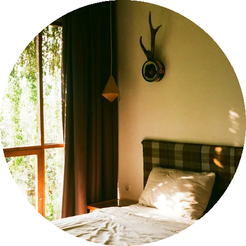 A made bed in a holiday rental