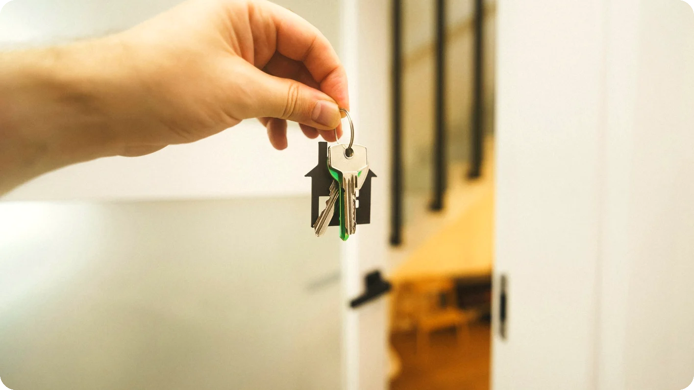 Handing over house keys before a clean